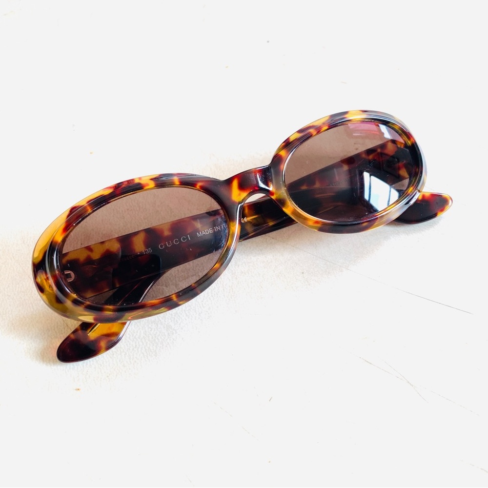 Gucci Tortoiseshell sunglasses oval amber lenses